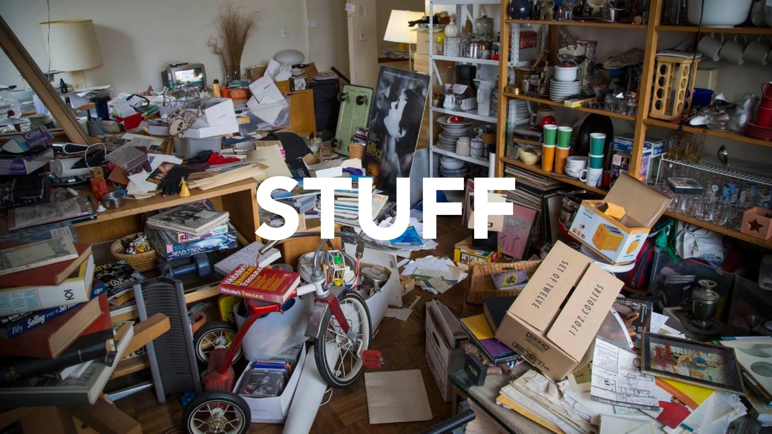Manifesto slide: “STUFF” in big white letters over a photo of a room buried in clutter
