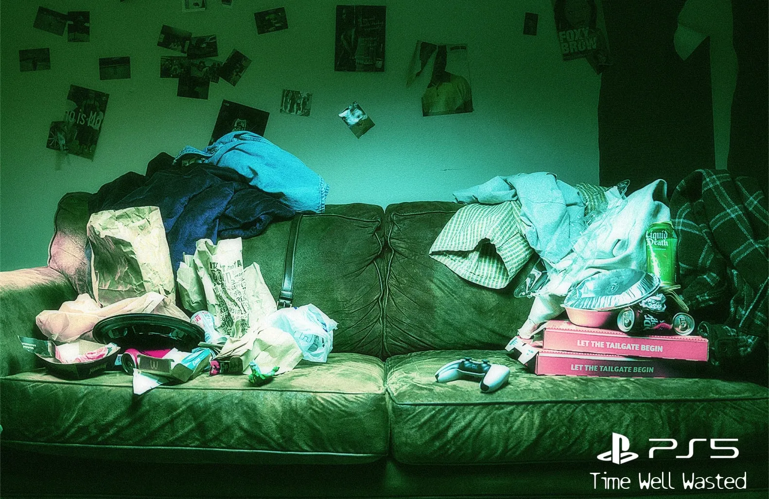 A leather couch buried in fast-food bags, cans, clothes and pizza boxes, a controller left on the middle cushion. “Time Well Wasted” with the PS5 logo